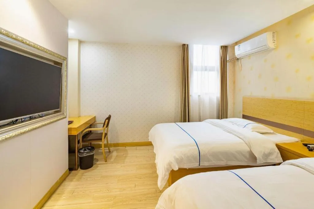 Bed in GreenTree Inn Express Shanghai Baoshan District Youyi Road Metro Station