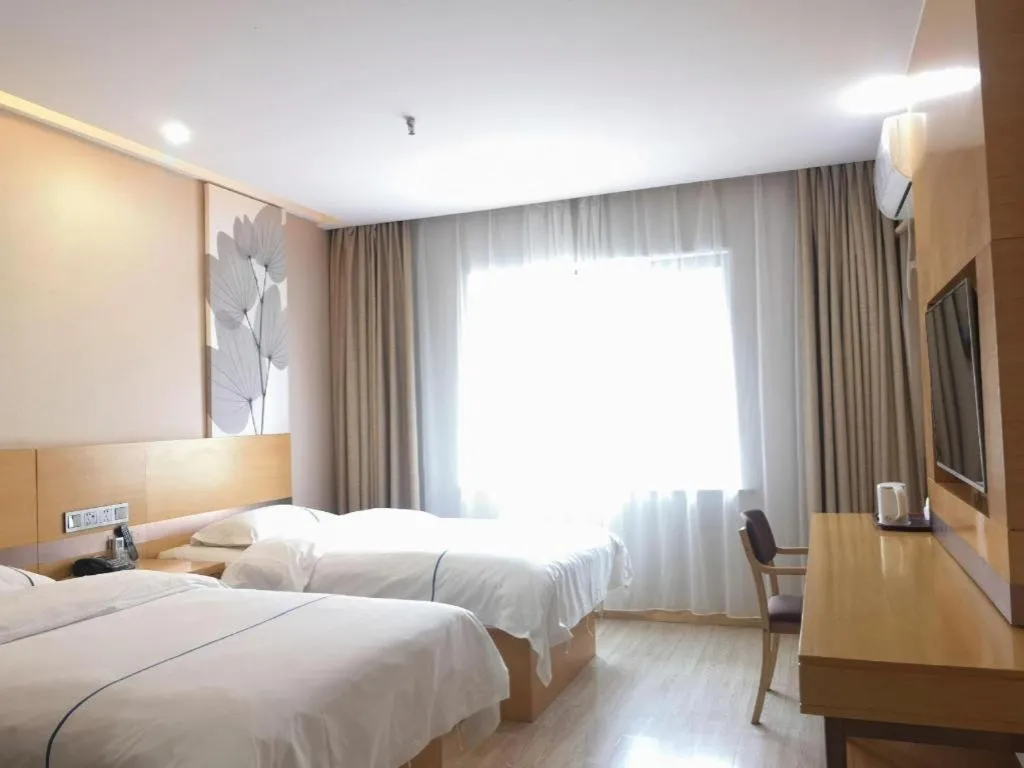 Bed in GreenTree Inn Express Shanghai Baoshan District Youyi Road Metro Station