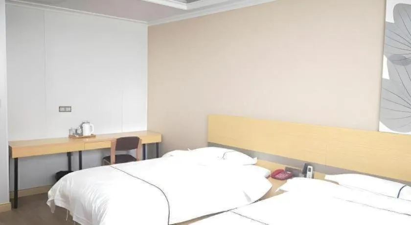 Bed in GreenTree Inn Express Shanghai Baoshan District Youyi Road Metro Station