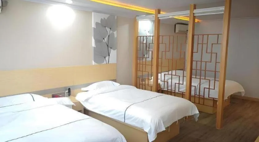 Bed in GreenTree Inn Express Shanghai Baoshan District Youyi Road Metro Station