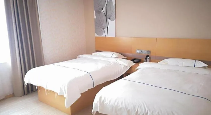 Bed in GreenTree Inn Express Shanghai Baoshan District Youyi Road Metro Station