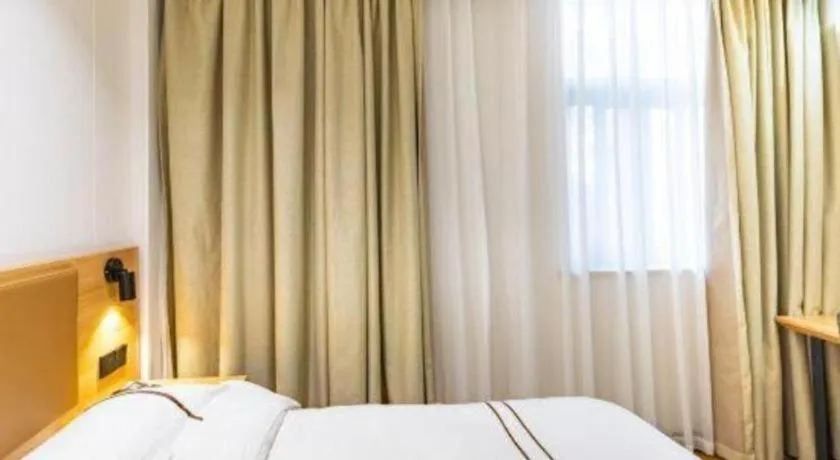 Bed in GreenTree Inn Express Shanghai Baoshan District Youyi Road Metro Station