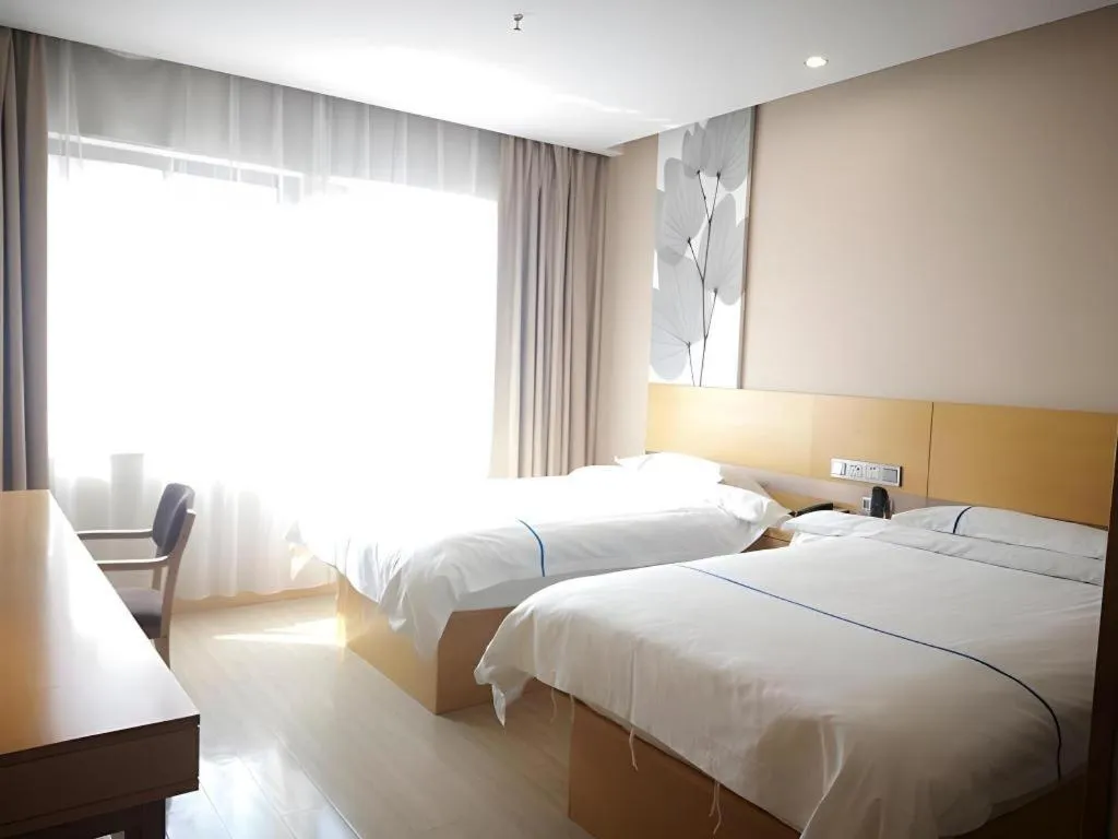 Bed in GreenTree Inn Express Shanghai Baoshan District Youyi Road Metro Station