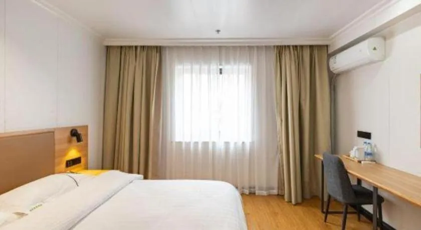 Bed in GreenTree Inn Express Shanghai Baoshan District Youyi Road Metro Station