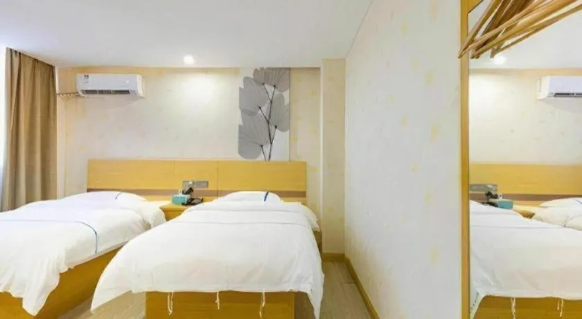 Bed in GreenTree Inn Express Shanghai Baoshan District Youyi Road Metro Station