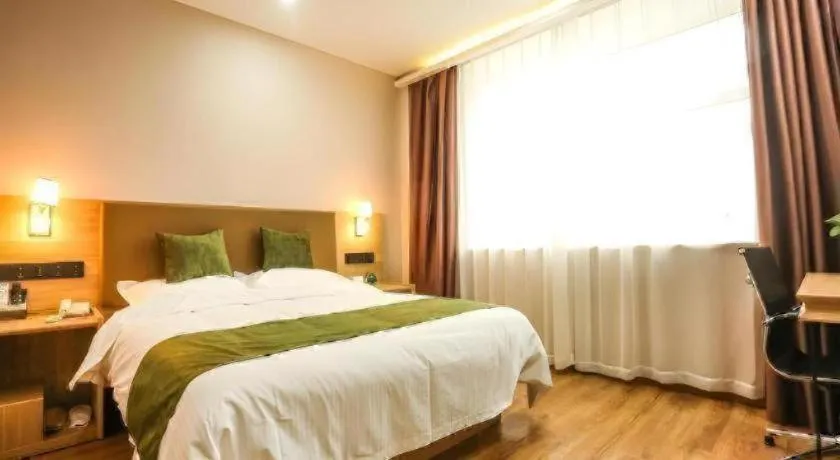 Bed in GreenTree Inn Express Xuzhou Pizhou Tiefu Town Bus station.