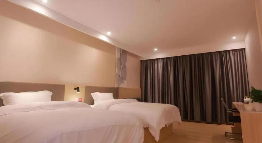 Bed in Shell Hotel Chuzhou Economic Development Zone Internation Shangcheng