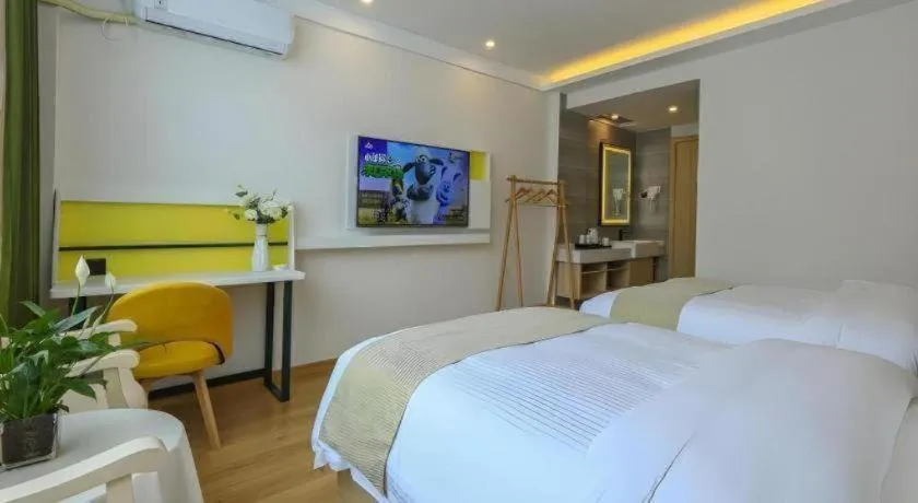 Bed in Vatica Hotel Huangshan South Gate Terminal Station