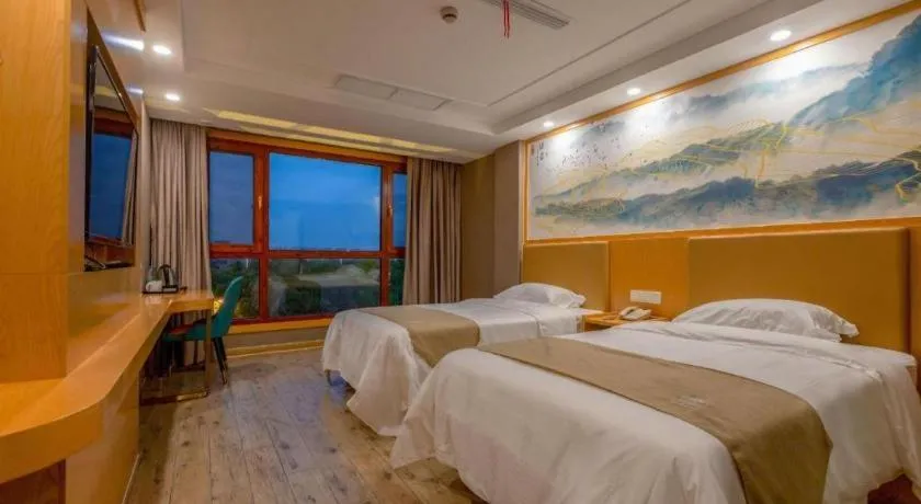 Bed in Shell Hotel Changzhou North Railway Station Global Harbor Metro Station