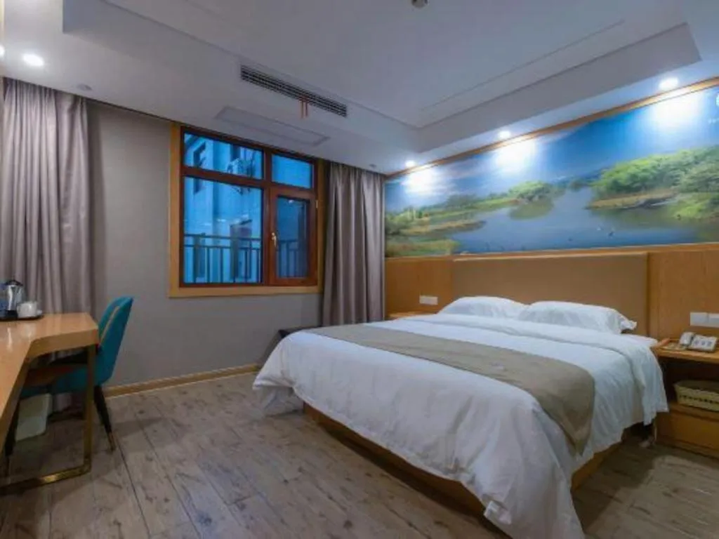 Bed in Shell Hotel Changzhou North Railway Station Global Harbor Metro Station