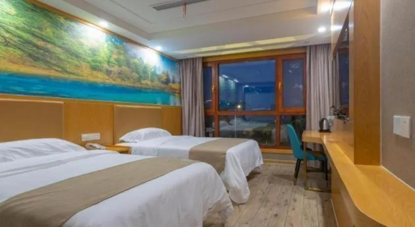 Bed in Shell Hotel Changzhou North Railway Station Global Harbor Metro Station