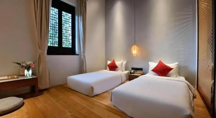 Bed in Blossom House Nanxun Qiushu Lane