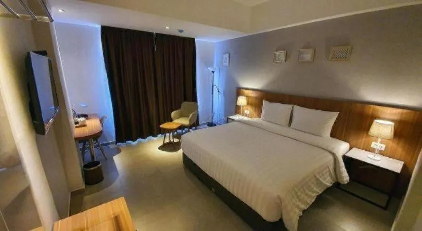 Bed in Hart Hotel Premium Rapatmaja