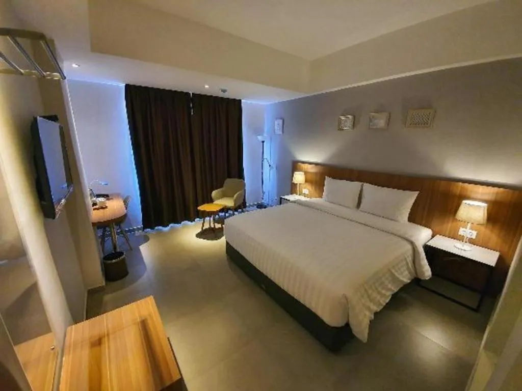 Bed in Hart Hotel Premium Rapatmaja