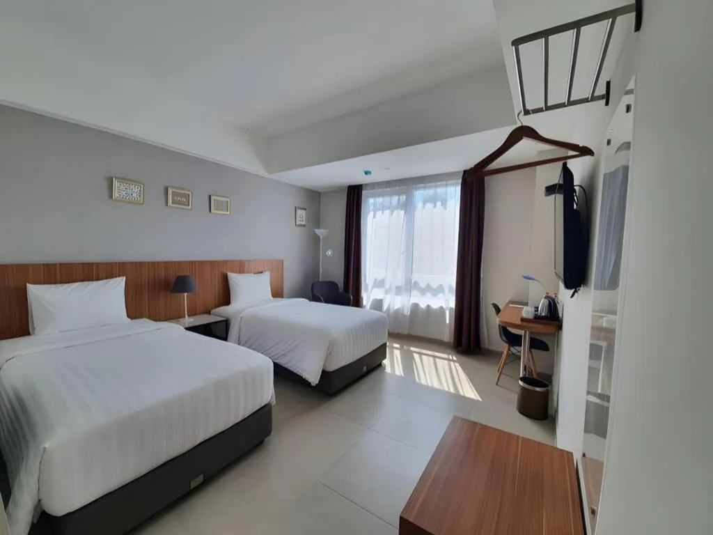 Bed in Hart Hotel Premium Rapatmaja