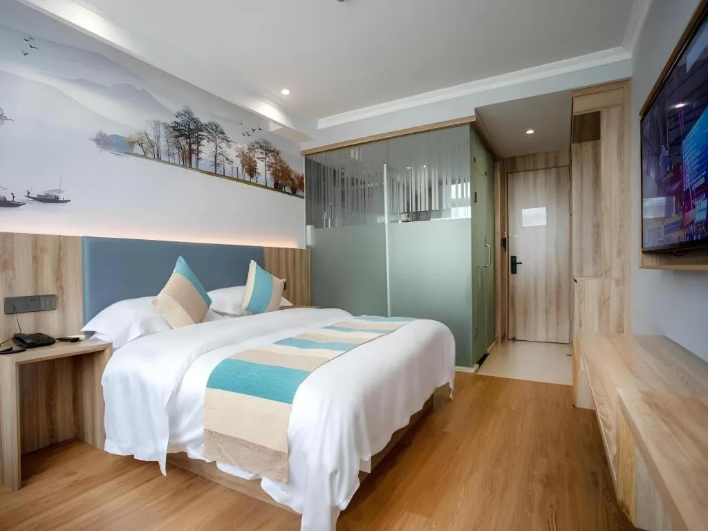 Bed in VX Hotel Hangzhou Banshan