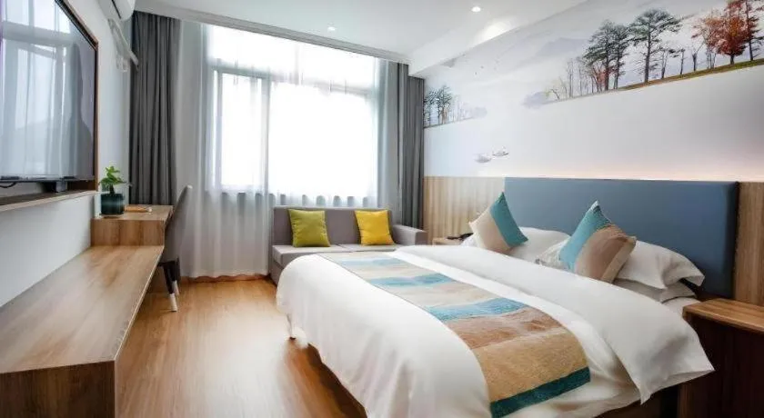 Bed in VX Hotel Hangzhou Banshan