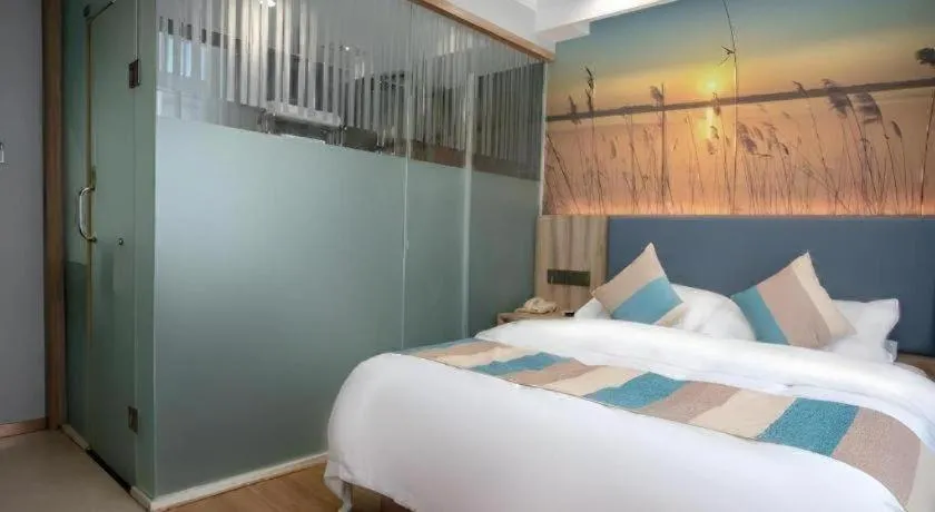Bed in VX Hotel Hangzhou Banshan