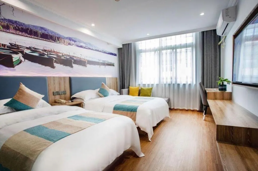 Bed in VX Hotel Hangzhou Banshan