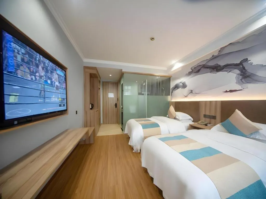 Bed in VX Hotel Hangzhou Banshan