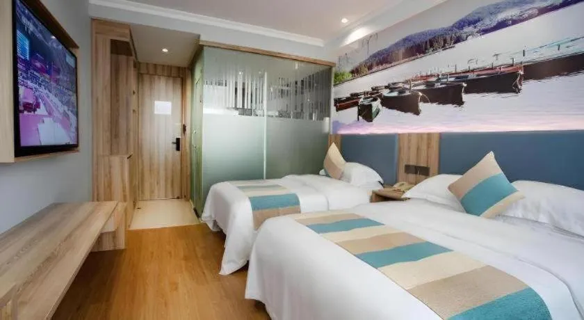 Bed in VX Hotel Hangzhou Banshan