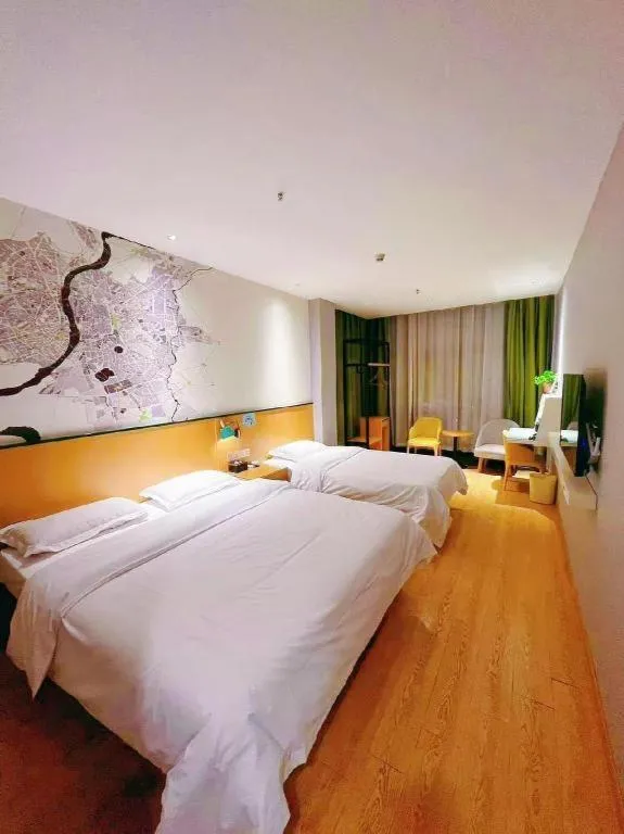 Bed in Vatica Hotel Hefei Yaohai Longgang Subway Station