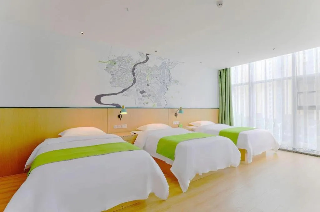 Bed in Vatica Hotel Hefei Yaohai Longgang Subway Station