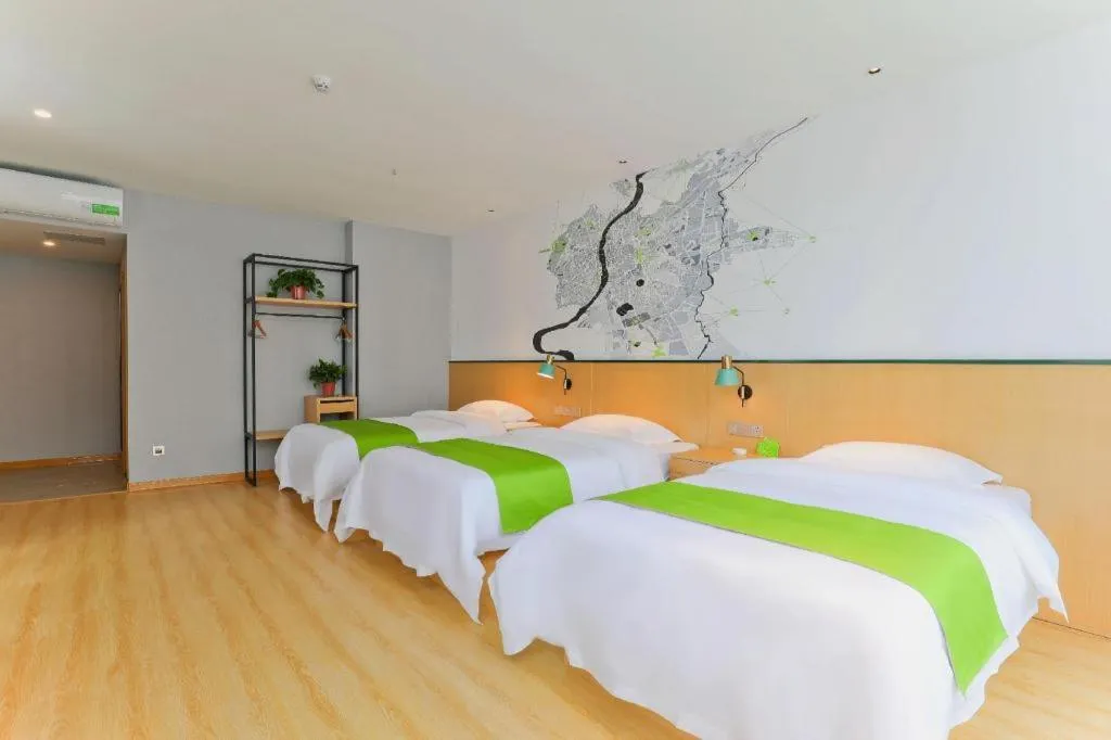 Bed in Vatica Hotel Hefei Yaohai Longgang Subway Station