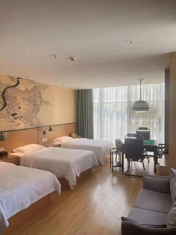 Bed in Vatica Hotel Hefei Yaohai Longgang Subway Station