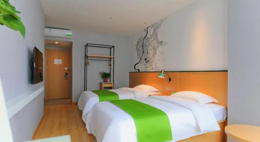 Bed in Vatica Hotel Hefei Yaohai Longgang Subway Station