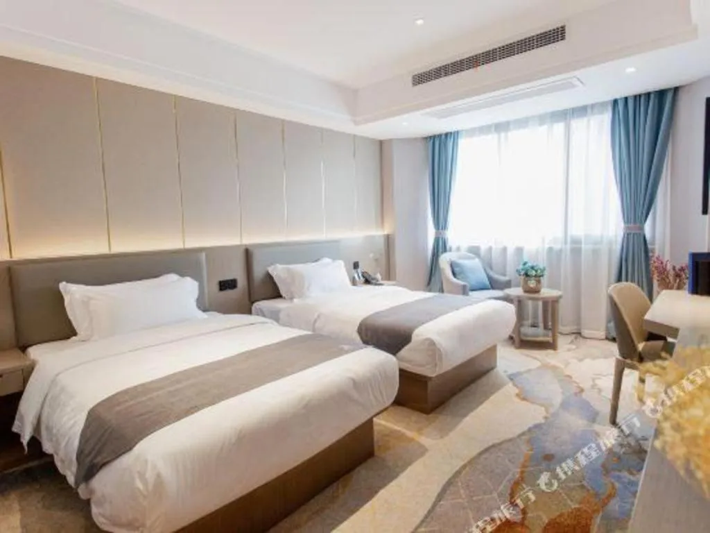 Bed in GreenTree Eastern Hotel Chizhou Tonghui Plaza