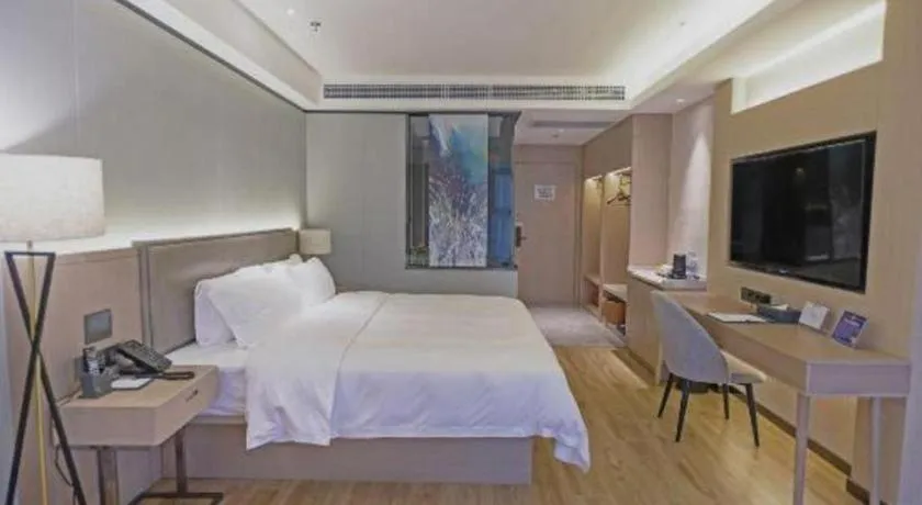 Bed in Gya Hotel Nantong Nanshang Lake Street Wanda Plaza