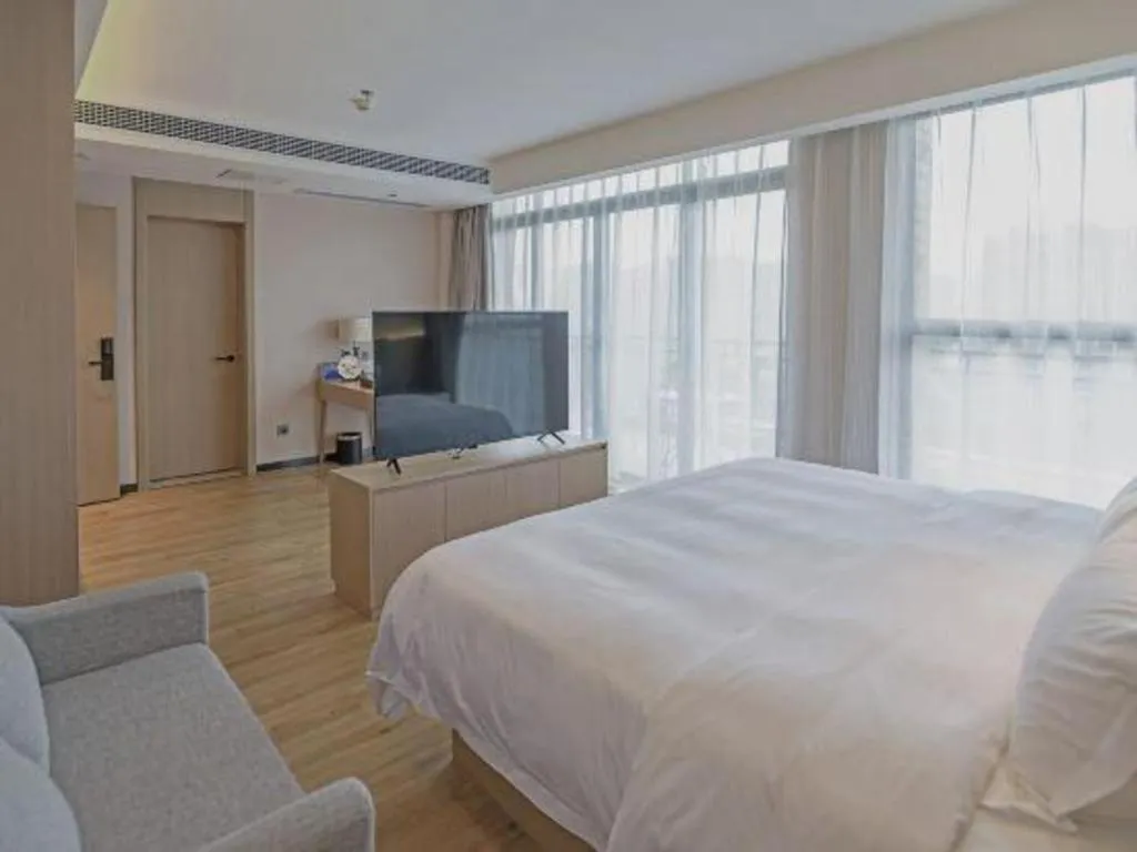 Bed in Gya Hotel Nantong Nanshang Lake Street Wanda Plaza