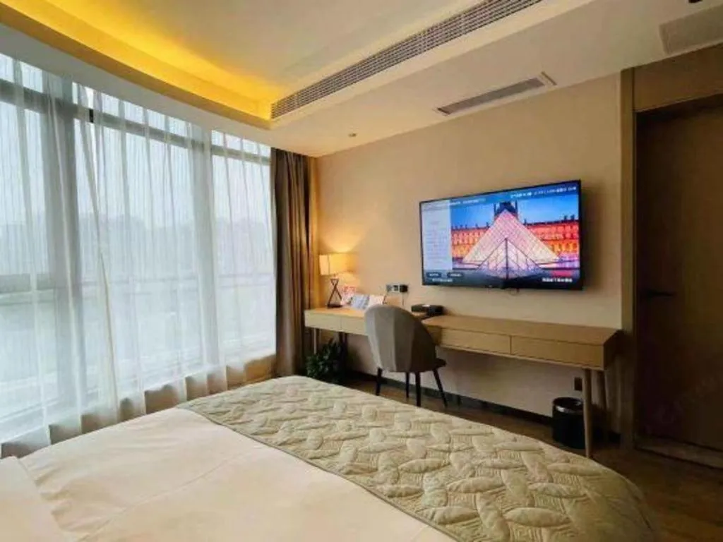 Bed in Gya Hotel Nantong Nanshang Lake Street Wanda Plaza