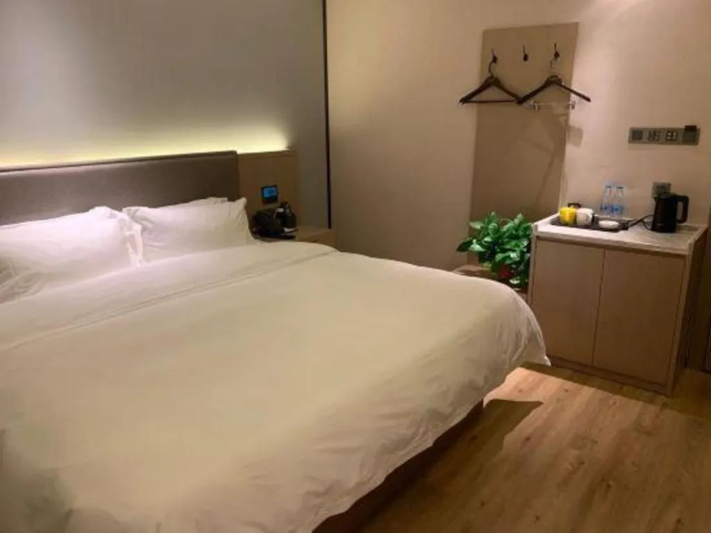 Bed in Gya Hotel Nantong Nanshang Lake Street Wanda Plaza