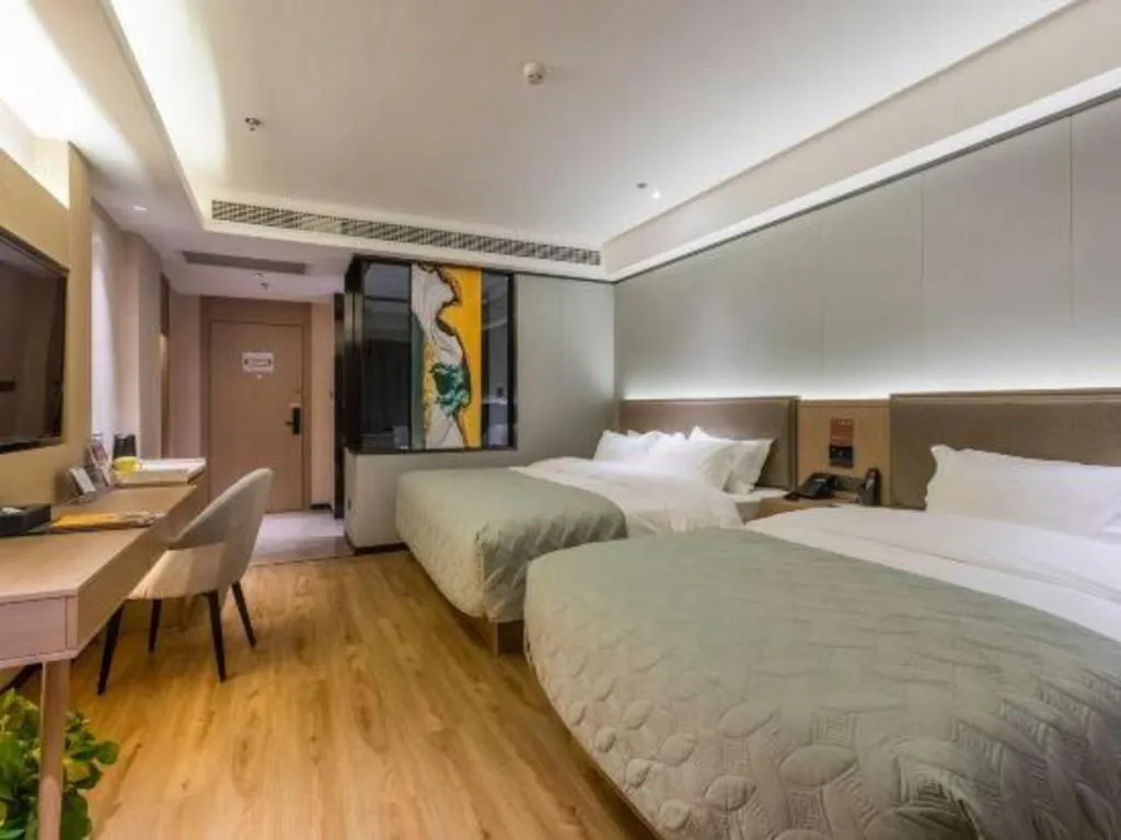 Bed in Gya Hotel Nantong Nanshang Lake Street Wanda Plaza