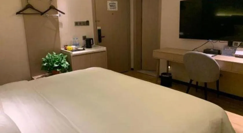 Bed in Gya Hotel Nantong Nanshang Lake Street Wanda Plaza
