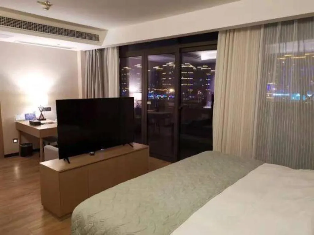 Bed in Gya Hotel Nantong Nanshang Lake Street Wanda Plaza