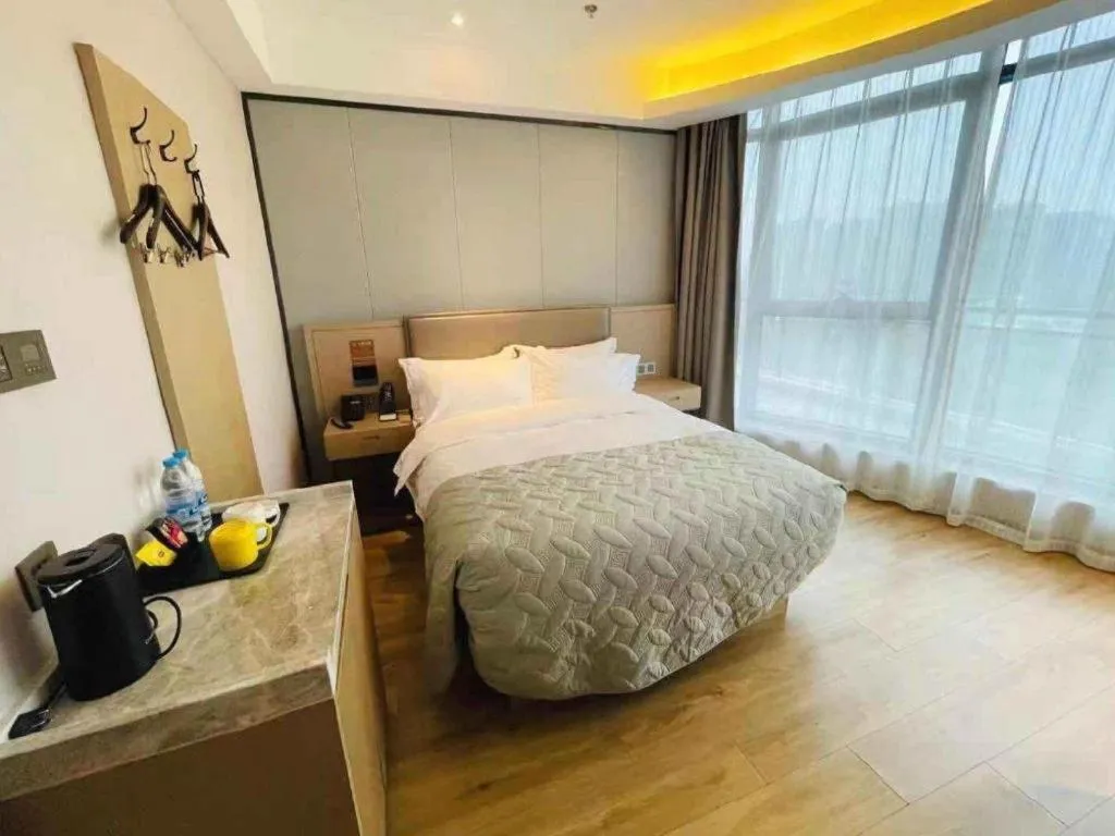Bed in Gya Hotel Nantong Nanshang Lake Street Wanda Plaza