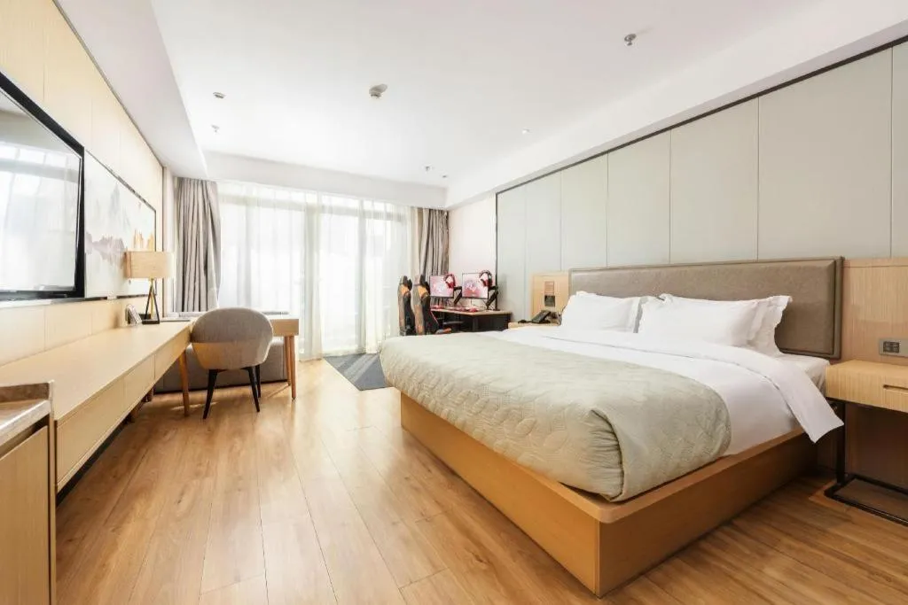 Bed in Gya Hotel Nantong Nanshang Lake Street Wanda Plaza