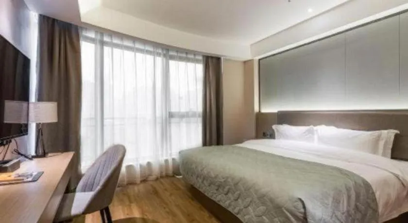 Bed in Gya Hotel Nantong Nanshang Lake Street Wanda Plaza