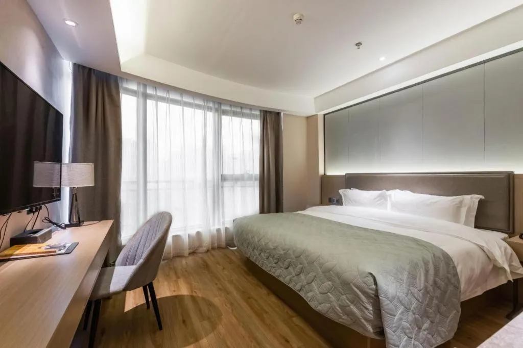 Bed in Gya Hotel Nantong Nanshang Lake Street Wanda Plaza