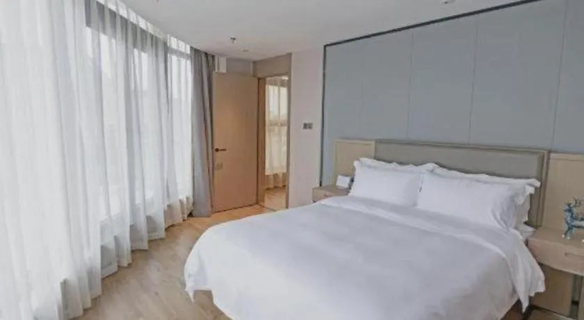 Bed in Gya Hotel Nantong Nanshang Lake Street Wanda Plaza