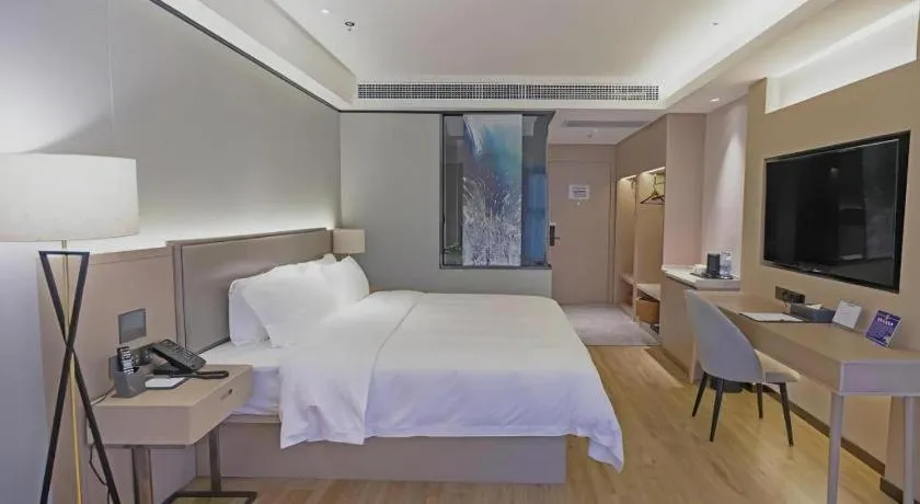 Bed in Gya Hotel Nantong Nanshang Lake Street Wanda Plaza