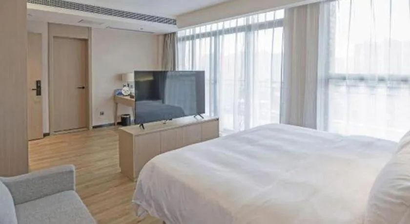 Bed in Gya Hotel Nantong Nanshang Lake Street Wanda Plaza