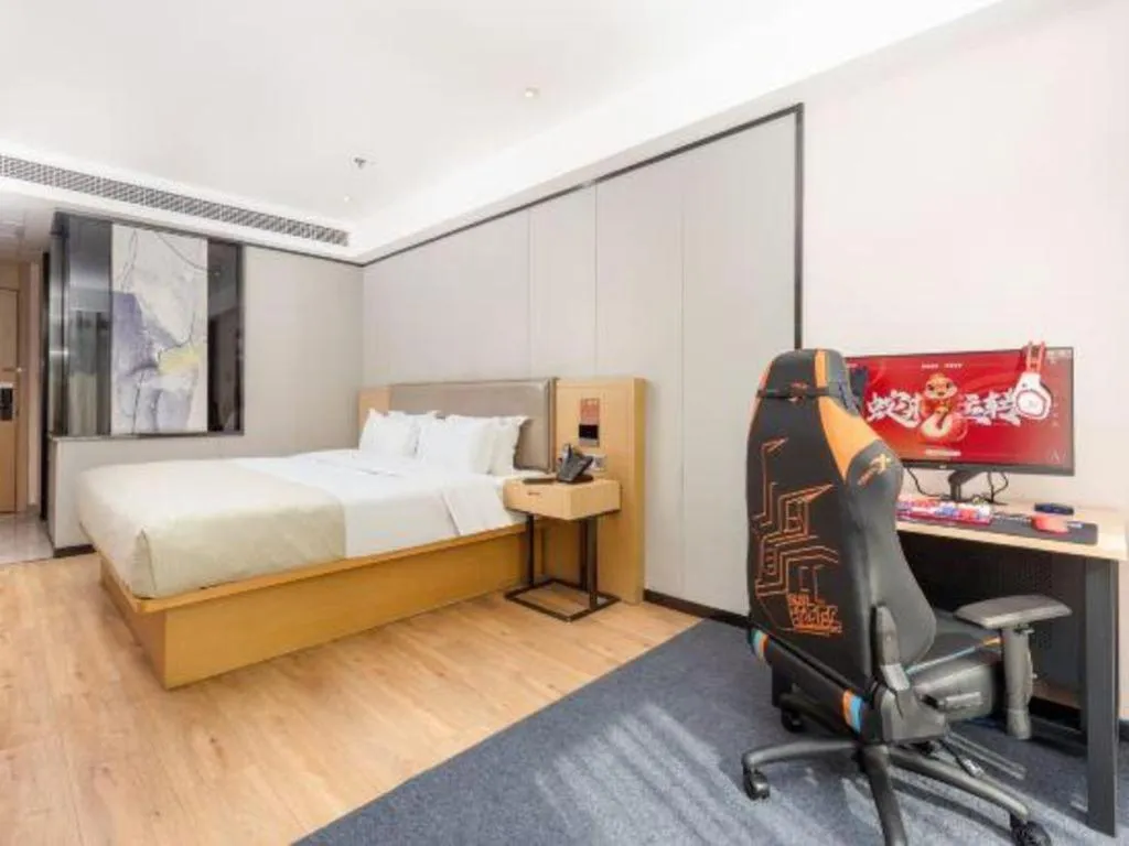 Bed in Gya Hotel Nantong Nanshang Lake Street Wanda Plaza
