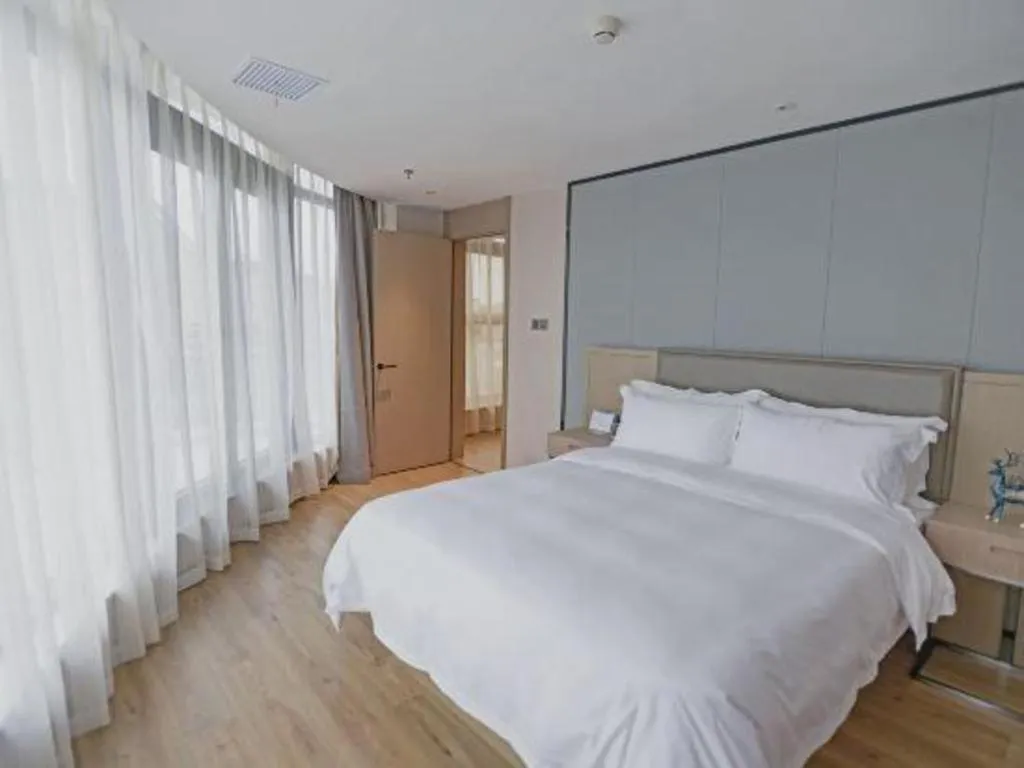 Bed in Gya Hotel Nantong Nanshang Lake Street Wanda Plaza