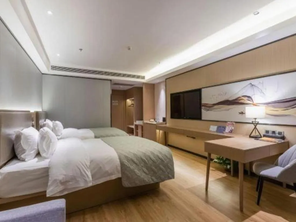 Bed in Gya Hotel Nantong Nanshang Lake Street Wanda Plaza