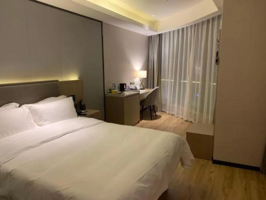 Bed in Gya Hotel Nantong Nanshang Lake Street Wanda Plaza