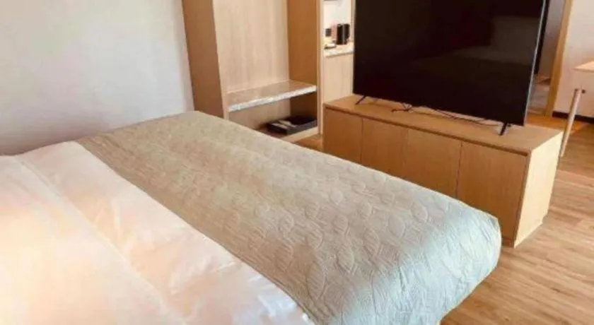 Bed in Gya Hotel Nantong Nanshang Lake Street Wanda Plaza